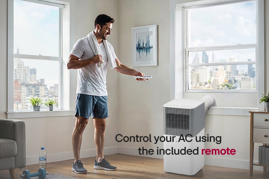 LG LP0526PGF portable air conditioner shown with remote in a staged room scene; manufacturer marketing image.